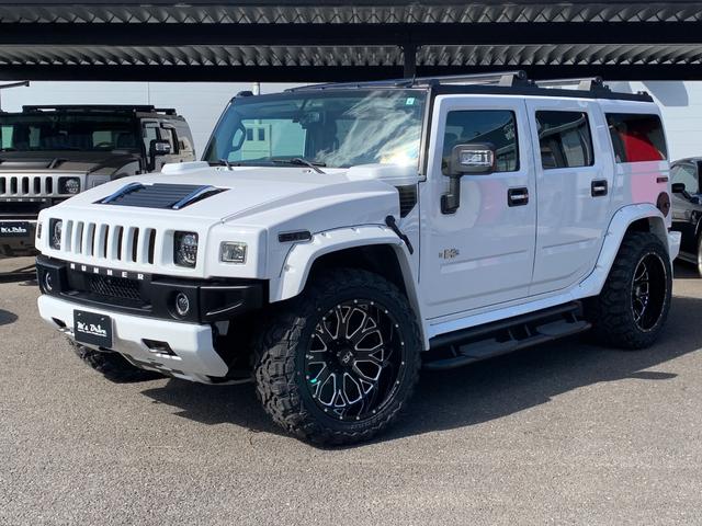 ハマーＨ２ ラグジュアリーパッケージ　新車並行／０８年最終型／社外オーバーフェンダー／新品ＨＡＲＤＲＯＣＫ２２インチ／新品マッドタイヤ／新品ＬＥＤヘッドライト／ワンオフ４本出マフラー／ＬＥＤスモークテール／ナビＴＶ（13枚目）