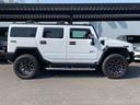 ハマーＨ２ ラグジュアリーパッケージ　新車並行／０８年最終型／社外オーバーフェンダー／ＨＡＲＤＲＯＣＫ２２インチ／ＡＭＰマッドタイヤ／新品ＬＥＤヘッドライト／ワンオフ４本出マフラー／ＬＥＤテール／ナビＴＶ（7枚目）