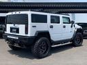 ハマーＨ２ ラグジュアリーパッケージ　新車並行／０８年最終型／社外オーバーフェンダー／ＨＡＲＤＲＯＣＫ２２インチ／ＡＭＰマッドタイヤ／新品ＬＥＤヘッドライト／ワンオフ４本出マフラー／ＬＥＤテール／ナビＴＶ（8枚目）