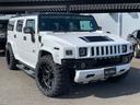 ハマーＨ２ ラグジュアリーパッケージ　新車並行／０８年最終型／社外オーバーフェンダー／新品ＨＡＲＤＲＯＣＫ２２インチ／新品マッドタイヤ／新品ＬＥＤヘッドライト／ワンオフ４本出マフラー／ＬＥＤスモークテール／ナビＴＶ（4枚目）
