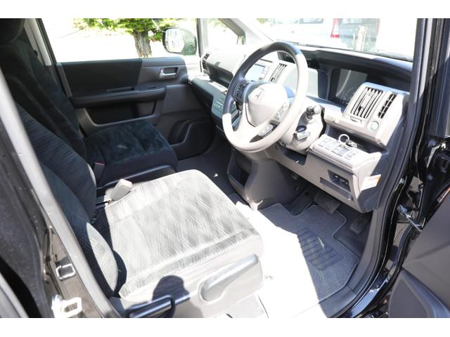 ステップワゴン Ｇ　Ｅセレクション　４ＷＤ　純正ナビ　ワンセグ　バックカメラ　左パワースライドドア　エンジンスターター　社外アルミ　禁煙車（2枚目）