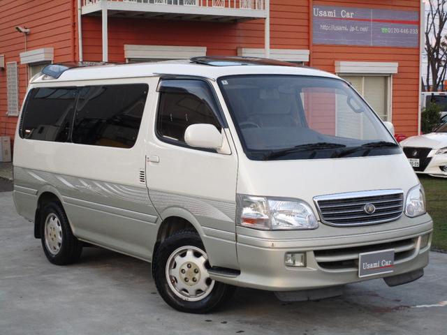 ハイエースワゴン スーパーカスタムリミテッド　トリプルサンルーフ　コンビハンドル　回転シート　運転席パワーシート　　ＥＴＣ　７人乗り　電動カーテン　フルフラット　点検記録簿あり　１５インチ純正アルミ　１００Ｖ　リアエアコン　リアヒーター（2枚目）