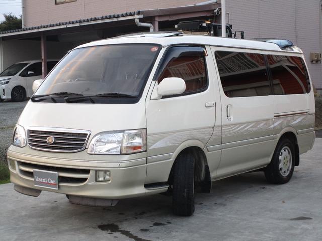 ハイエースワゴン スーパーカスタムリミテッド　トリプルサンルーフ　コンビハンドル　回転シート　運転席パワーシート　　ＥＴＣ　７人乗り　電動カーテン　フルフラット　点検記録簿あり　１５インチ純正アルミ　１００Ｖ　リアエアコン　リアヒーター（5枚目）