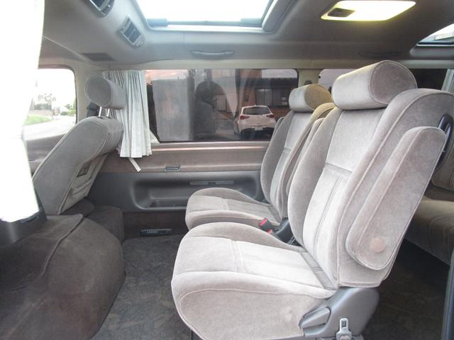 ハイエースワゴン スーパーカスタムリミテッド　トリプルサンルーフ　コンビハンドル　回転シート　運転席パワーシート　　ＥＴＣ　７人乗り　電動カーテン　フルフラット　点検記録簿あり　１５インチ純正アルミ　１００Ｖ　リアエアコン　リアヒーター（33枚目）