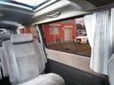 スーパーカスタムリミテッド　トリプルサンルーフ　コンビハンドル　回転シート　運転席パワーシート　　ＥＴＣ　７人乗り　電動カーテン　フルフラット　点検記録簿あり　１５インチ純正アルミ　１００Ｖ　リアエアコン　リアヒーター（26枚目）