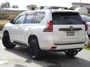 ランドクルーザープラド TX Lパッケージ 70thアニバーサリーリミテッド サンルーフ 禁煙車 メーカーOP9型ナビ パノラミックビューモニター ウッド調ステアリング サントレックスヒッチメンバー システムラック レーダークルーズ 茶革シート セーフティセンス Eスターター 中古車画像_4