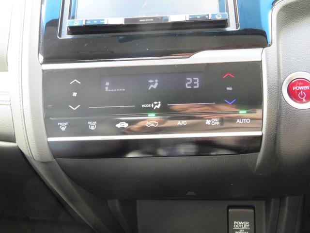 フィットハイブリッド Ｌパッケージ　社外ナビゲーション／デジタルテレビ／Ｂｌｕｅｔｏｏｔｈ／バックカメラ／社外１５ＡＷ／ＬＥＤヘッドランプ／ハーフレザーシート／クルーズコントロール／オートエアコン／前席エアバック／盗難防止装置（34枚目）