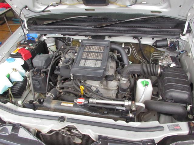 ジムニー ＸＧ　切替式４ＷＤ　６型　ターボ　５ＭＴ　キーレス　純正オーディオ　ＥＴＣ　前席パワーウインドウ　パワーステアリング　ＡＢＳ（47枚目）