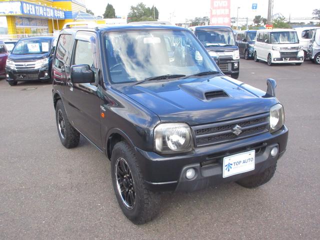 ジムニー ワイルドウインド　切替式４ＷＤ　ターボ　５ＭＴ　キーレス　純正オーディオ　ＣＤ　ＥＴＣ　シートヒーター　フォグライト　電動格納ミラー　ルーフレール付　社外アルミホイール　ＡＢＳ　無修復歴車（12枚目）