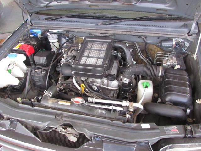 ジムニー ワイルドウインド　切替式４ＷＤ　ターボ　５ＭＴ　キーレス　純正オーディオ　ＣＤ　ＥＴＣ　シートヒーター　フォグライト　電動格納ミラー　ルーフレール付　社外アルミホイール　ＡＢＳ　無修復歴車（24枚目）