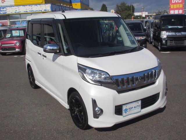 ｅＫスペースカスタム カスタムＴ　４ＷＤ　ターボ　電動スライドドア　ナビ　ＴＶ　ＣＤ／ＤＶＤ再生　Ｂｌｕｅｔｏｏｔｈ接続　ＥＴＣ　バックカメラ　シートヒーター　オートライト　ＨＩＤライト　フォグライト　社外アルミホイール　無修復歴車（12枚目）