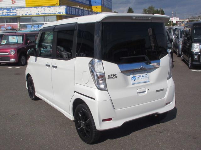 ｅＫスペースカスタム カスタムＴ　４ＷＤ　ターボ　電動スライドドア　ナビ　ＴＶ　ＣＤ／ＤＶＤ再生　Ｂｌｕｅｔｏｏｔｈ接続　ＥＴＣ　バックカメラ　シートヒーター　オートライト　ＨＩＤライト　フォグライト　社外アルミホイール　無修復歴車（18枚目）