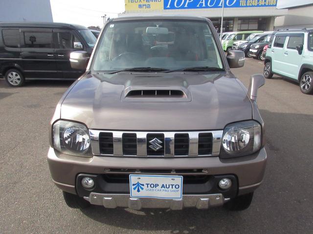 ジムニー クロスアドベンチャー　切替式４ＷＤ　ターボ　キーレス　ディスプレイオーディオ　ＣＤ／ＤＶＤ再生　ＵＳＢ　シートヒーター　フォグライト　電動格納ミラー　専用シート　純正アルミホイール　ＡＢＳ　無修復歴車（4枚目）