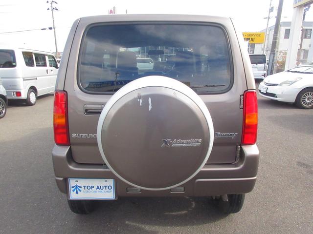 ジムニー クロスアドベンチャー　切替式４ＷＤ　ターボ　キーレス　ディスプレイオーディオ　ＣＤ／ＤＶＤ再生　ＵＳＢ　シートヒーター　フォグライト　電動格納ミラー　専用シート　純正アルミホイール　ＡＢＳ　無修復歴車（6枚目）