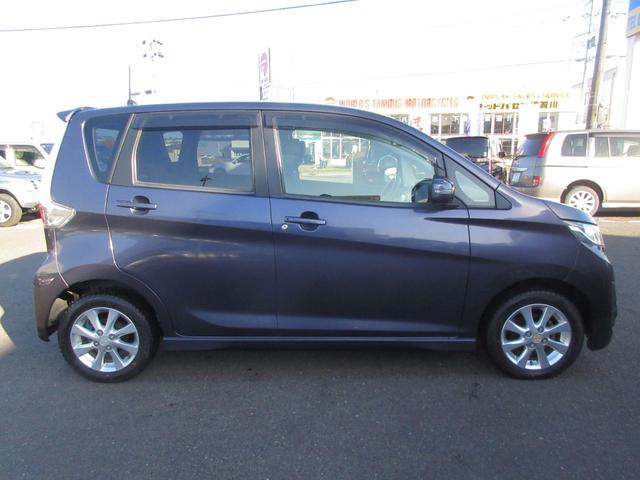 ｅＫカスタム Ｇ　４ＷＤ　修復歴無し　ナビ　フルセグ　Ｂｌｕｅｔｏｏｔｈ　バックカメラ　エンジンスターター　シートヒーター　ＣＤ　ＤＶＤ　ＨＩＤ　プッシュスタート　アルミホイール（8枚目）