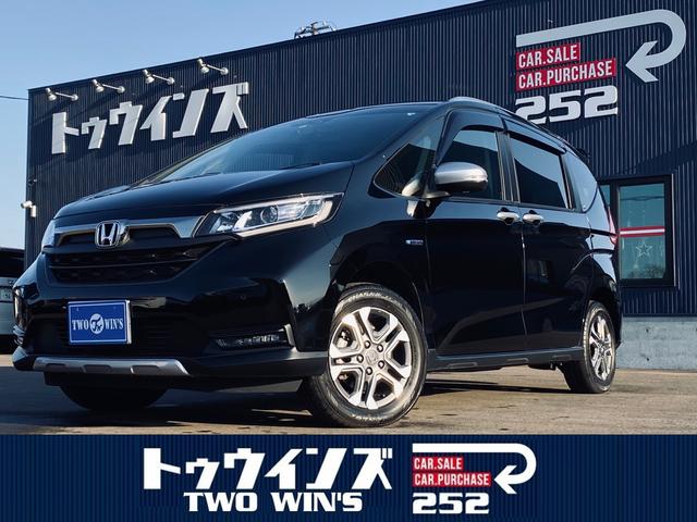 ホンダ フリードハイブリッド その他 ハイブリッド クロスターホンダセンシング ４ｗｄ ９インチプレミアムインターナビ バックカメラ ホンダセンシング エンジンスターター ドライブレコーダー 両側パワースライドドア 寒冷地仕様 パーキングセンサー 中古車検索