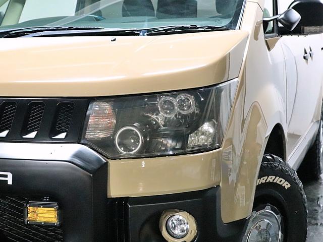 Ｇ　ナビパッケージ　距離無制限１年間保証付き／４ＷＤ／後席モニター／新品社外ホイール／新品マッドタイヤ／新品バンパーガード／パワースライドドア(6枚目)