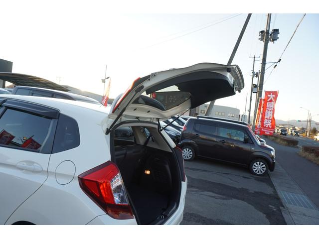 フィットハイブリッド Ｌパッケージ　４ＷＤ　ナビ　フルセグＴＶ　バックモニター　プッツシュスタート　クルーズコントロール　オートライト　ＥＴＣ　電動格納ミラー　ＬＥＤヘッドライト　２年保証付（40枚目）