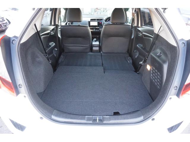 フィットハイブリッド Ｌパッケージ　４ＷＤ　ナビ　フルセグＴＶ　バックモニター　プッツシュスタート　クルーズコントロール　オートライト　ＥＴＣ　電動格納ミラー　ＬＥＤヘッドライト　２年保証付（48枚目）