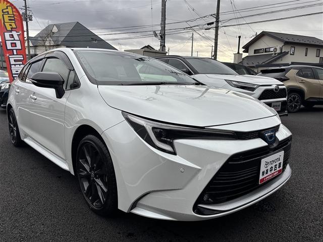 カローラツーリング ハイブリッド　ダブルバイビー　４ＷＤ　衝突被害軽減システム　バックカメラ　フルセグ　ＬＥＤヘッドランプ　アルミホイール　スマートキー　オートクルーズコントロール　ＥＴＣ　盗難防止装置　キーレス　横滑り防止機能　ハイブリッド（3枚目）