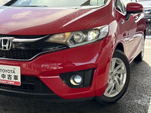 フィットハイブリッド Ｌパッケージ　寒冷地　衝突被害軽減システム　メモリーナビ　バックカメラ　ワンセグ　ＬＥＤヘッドランプ　アルミホイール　スマートキー　オートクルーズコントロール　ＥＴＣ　盗難防止装置　キーレス　横滑り防止機能（32枚目）