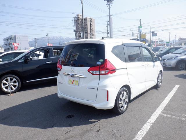 ハイブリッド・Gホンダセンシング 大阪仕入れ 禁煙車 衝突軽減 レーンアシスト 両側電動スライドドア レーダークルーズコントロール 純正SDナビ CD・DVD再生 フリップダウンモニター アイドリングストップ 横滑防止 ETC ABS(11枚目)