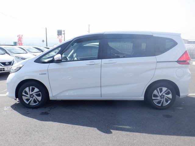 ハイブリッド・Gホンダセンシング 大阪仕入れ 禁煙車 衝突軽減 レーンアシスト 両側電動スライドドア レーダークルーズコントロール 純正SDナビ CD・DVD再生 フリップダウンモニター アイドリングストップ 横滑防止 ETC ABS(13枚目)