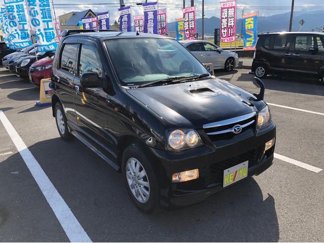 カスタムL 禁煙車 4WD ターボ 7インチナビ フルセグTV 15インチ純正アルミホイール CD・DVD再生 USB接続 ETC センターデフロック 前方録画ドライブレコーダー キーレス リアスポイラー(5枚目)