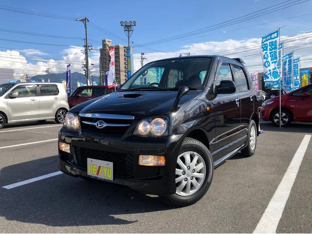 カスタムL 禁煙車 4WD ターボ 7インチナビ フルセグTV 15インチ純正アルミホイール CD・DVD再生 USB接続 ETC センターデフロック 前方録画ドライブレコーダー キーレス リアスポイラー(54枚目)
