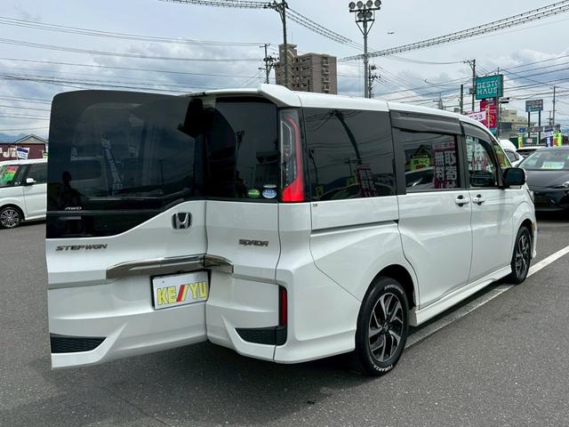 ステップワゴンスパーダ スパーダ・クールスピリット　ホンダセンシング【４ＷＤ】　【両側電動スライドドア＆フリップダウンモニター】【純正９インチフルセグナビ＆全方位カメラ＆Ｂｌｕｅｔｏｏｔｈ＆ＣＤ／ＤＶＤ再生】【ドラレコ＆ＥＴＣ】【ＬＥＤヘッドライト＆フォグライト】【純正エンスタ】（54枚目）