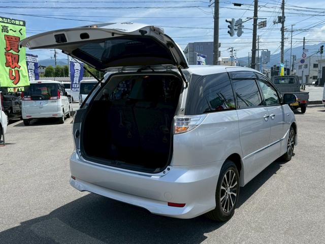 エスティマハイブリッド アエラス【４ＷＤ】【モデリスタエアロ】【】　【両側電動スライドドア＆フリップダウンモニター】【純正８インチナビ＆フルセグ＆バックカメラ＆Ｂｌｕｅｔｏｏｔｈ＆ＣＤ／ＤＶＤ再生】【２列目オットマンシート＆シートヒーター】【クルコン＆ツインエアコン】（50枚目）