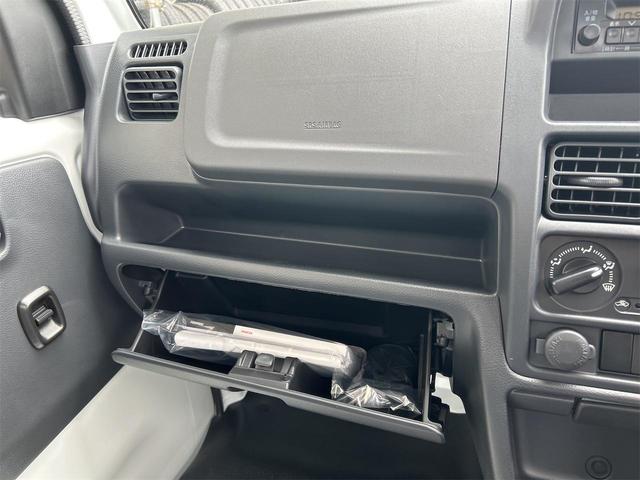 ミニキャブトラック Ｍ　４ＷＤ　５ＭＴ　クリアランスソナー　アイドリングストップ　オートライト　ＡＢＳ　ＥＳＣ　エアコン　パワーステアリング　パワーウィンドウ　運転席エアバッグ　助手席エアバッグ（24枚目）
