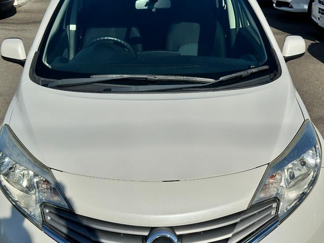 ノート Ｘ　車検２年　１年保証　修復歴なし　禁煙車　ナビ　ＴＶ　スマートキー　アイドリングストップ　電動格納ミラー　ＣＶＴ　盗難防止システム　衝突安全ボディ　ＡＢＳ（7枚目）