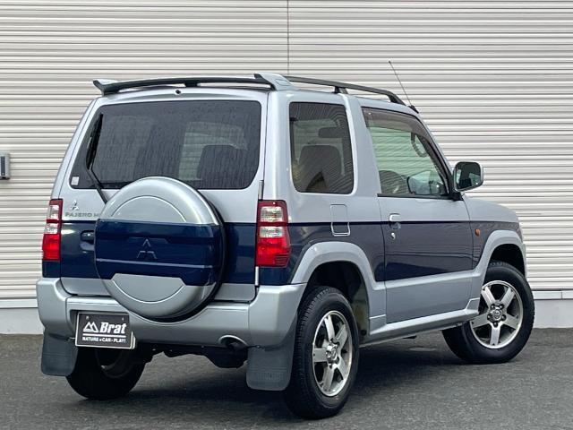 パジェロミニ ナビエディションＶＲ　４ＷＤ　純正ＳＤナビ　ＣＤ／ＤＶＤ／ワンセグＴＶ　電動格納ミラー　ライトレベライザー　ドアバイザー　キーレス　リモコンキー　ハロゲンヘッドライト　Ｗエアバック　ルーフレール　背面タイヤ　ＡＢＳ（32枚目）