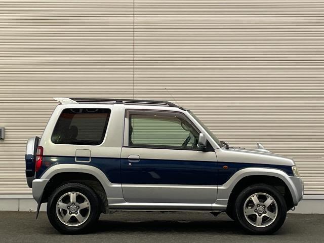 パジェロミニ ナビエディションＶＲ　４ＷＤ　純正ＳＤナビ　ＣＤ／ＤＶＤ／ワンセグＴＶ　電動格納ミラー　ライトレベライザー　ドアバイザー　キーレス　リモコンキー　ハロゲンヘッドライト　Ｗエアバック　ルーフレール　背面タイヤ　ＡＢＳ（33枚目）