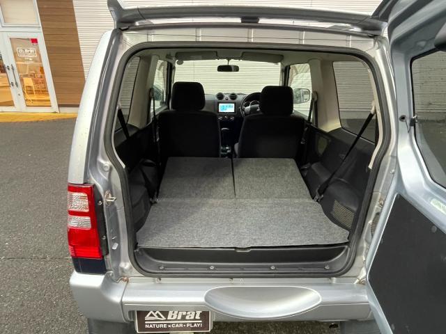 パジェロミニ ナビエディションＶＲ　４ＷＤ　純正ＳＤナビ　ＣＤ／ＤＶＤ／ワンセグＴＶ　電動格納ミラー　ライトレベライザー　ドアバイザー　キーレス　リモコンキー　ハロゲンヘッドライト　Ｗエアバック　ルーフレール　背面タイヤ　ＡＢＳ（36枚目）