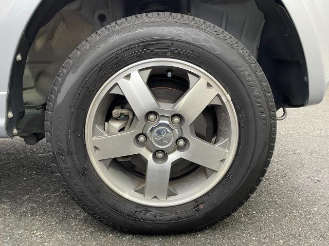 パジェロミニ ナビエディションＶＲ　４ＷＤ　純正ＳＤナビ　ＣＤ／ＤＶＤ／ワンセグＴＶ　電動格納ミラー　ライトレベライザー　ドアバイザー　キーレス　リモコンキー　ハロゲンヘッドライト　Ｗエアバック　ルーフレール　背面タイヤ　ＡＢＳ（39枚目）