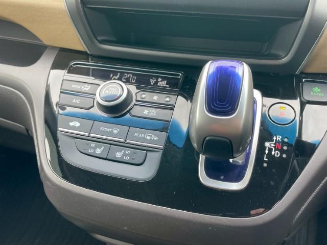 フリードハイブリッド ハイブリッド・Gホンダセンシング スペアキー バックカメラ スマートキー ホンダセンシング レーダークルーズ LEDヘッドライト 両側パワースライドドア ETC 前方ドラレコ フリップダウンモニター 横滑り防止(6枚目)