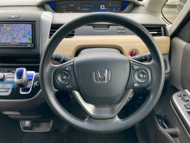 フリードハイブリッド ハイブリッド・Gホンダセンシング スペアキー バックカメラ スマートキー ホンダセンシング レーダークルーズ LEDヘッドライト 両側パワースライドドア ETC 前方ドラレコ フリップダウンモニター 横滑り防止(12枚目)