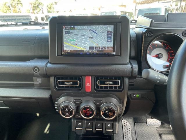 ジムニー ＸＣ　リフトアップ　社外ＡＷ　ブロックタイヤ　ルーフラック　シートカバー　筆記体エンブレム　ブルバー　ドラレコ　社外ナビ　ＣＤ／ＤＶＤ／ＢＴ／フルセグ（7枚目）