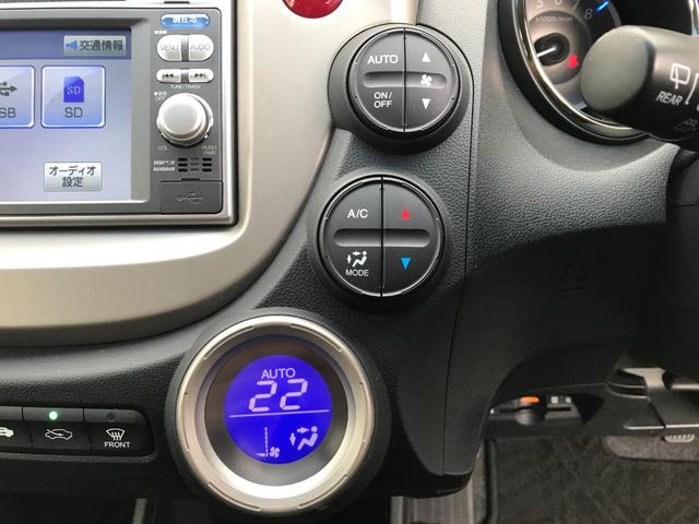 フィットハイブリッド スマートセレクション　ファインスタイル　純正ナビ　テレビ　バックカメラ　ＨＩＤ　スマートキー　エンジンスターター　両席シートヒーター　純正モデューロアルミホイール（16枚目）