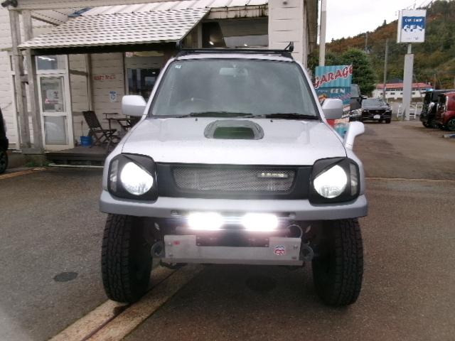 ジムニー ワイルドウインド　リフトアップ・社外バンパー・社外マフラー・ナビ・ＴＶ・Ｂカメラ・中古スタッドレス付（17枚目）