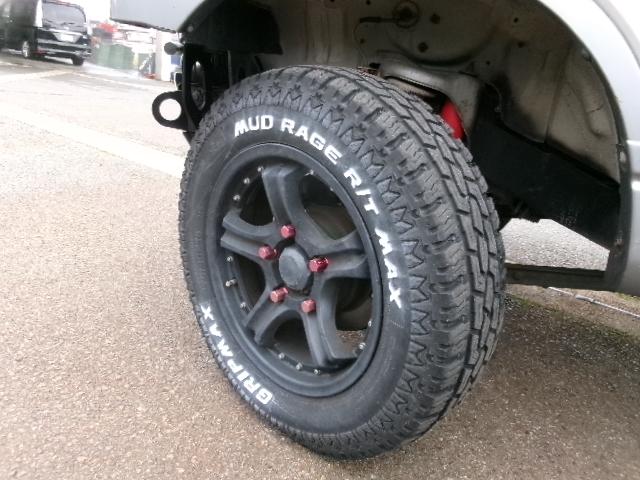 ジムニー ワイルドウインド　リフトアップ・社外バンパー・社外マフラー・ナビ・ＴＶ・Ｂカメラ・中古スタッドレス付（18枚目）