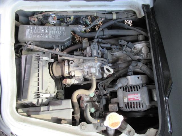 ミニキャブバン ブラボー　切替４ＷＤ　寒冷地仕様　ハイルーフ　５速マニュアル　キーレス　ＣＤ　ＥＴＣ　フォグランプ　前席パワーウインドウ　シートカバー　リヤアンダーミラー　タイベル交換歴あり　車両取扱説明書（14枚目）