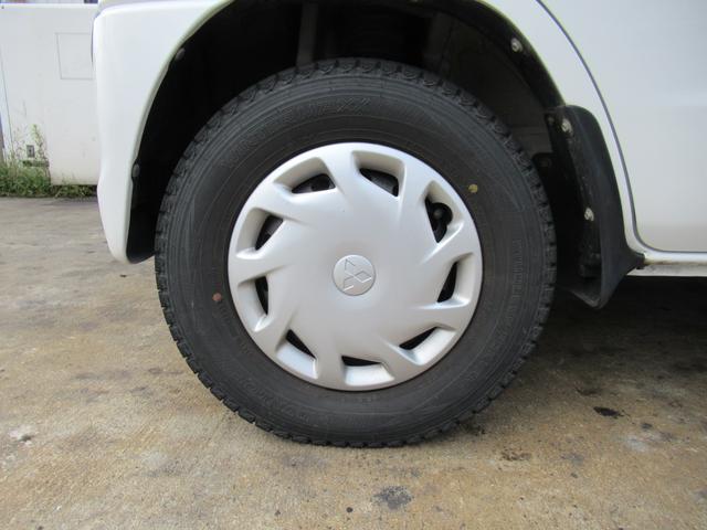 ミニキャブバン ブラボー　切替４ＷＤ　寒冷地仕様　ハイルーフ　５速マニュアル　キーレス　ＣＤ　ＥＴＣ　フォグランプ　前席パワーウインドウ　シートカバー　リヤアンダーミラー　タイベル交換歴あり　車両取扱説明書（17枚目）