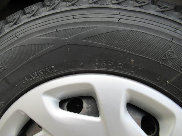 ミニキャブバン ブラボー　切替４ＷＤ　寒冷地仕様　ハイルーフ　５速マニュアル　キーレス　ＣＤ　ＥＴＣ　フォグランプ　前席パワーウインドウ　シートカバー　リヤアンダーミラー　タイベル交換歴あり　車両取扱説明書（18枚目）
