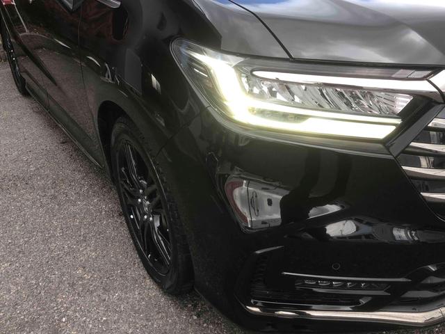 オデッセイハイブリッド ｅ：ＨＥＶアブソルート・ＥＸ　ハイブリッド　全周囲カメラ　ＴＶ　両側電動スライドドア　クリアランスソナー　オートクルーズコントロール　レーンアシスト　衝突被害軽減システム　オートライト　ＬＥＤヘッドランプ　パワーシート（23枚目）