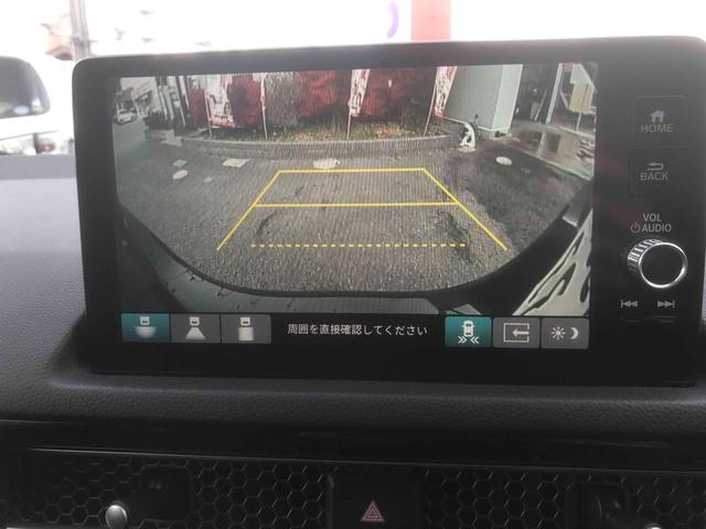 シビック ＬＸ　１８インチＡＷ　社外マフラー　ＬＥＤヘッドライト　純正ナビ・フルセグＴＶ　バックカメラ　ビルトインＥＴＣ２．０　ホンダセンシング　デジタルグラフィックメーター　ドライブレコーダー（5枚目）