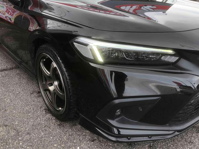 シビック ＬＸ　１８インチＡＷ　社外マフラー　ＬＥＤヘッドライト　純正ナビ・フルセグＴＶ　バックカメラ　ビルトインＥＴＣ２．０　ホンダセンシング　デジタルグラフィックメーター　ドライブレコーダー（23枚目）