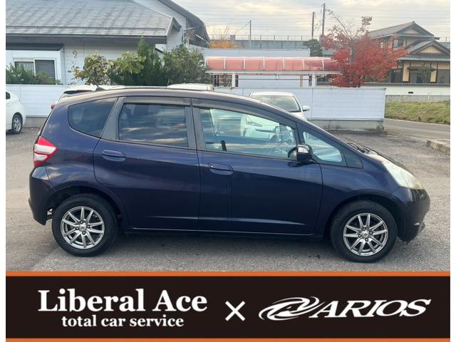 フィット Ｇ　スマートスタイルエディション　★車検令和８年９月★ナビ★テレビ★バックカメラ★ＥＴＣ★社外１４インチアルミホイール★スマートキー★エンジン型式Ｌ１３Ａ★カラーコードＰＢ８３Ｐプレミアムディープバイオレットパール★（5枚目）